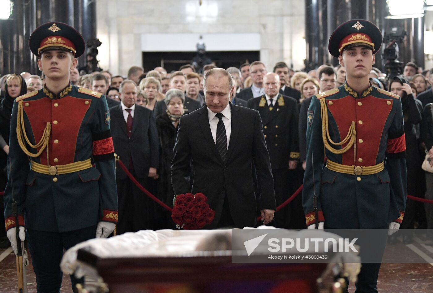 President Vladimir Putin and Prime Minister Dmitry Medvedev pay their last respects to Russian Ambassador to Turkey Andrei Karlov