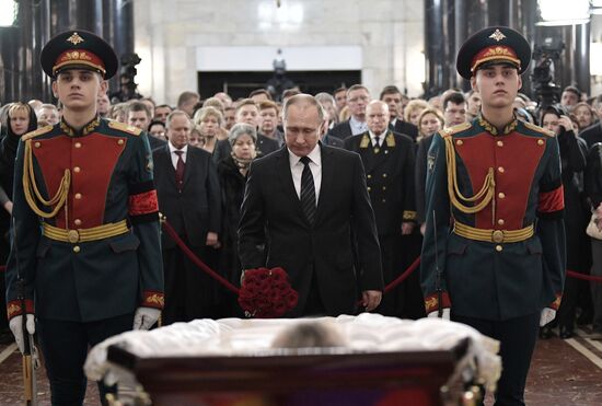 President Vladimir Putin and Prime Minister Dmitry Medvedev pay their last respects to Russian Ambassador to Turkey Andrei Karlov