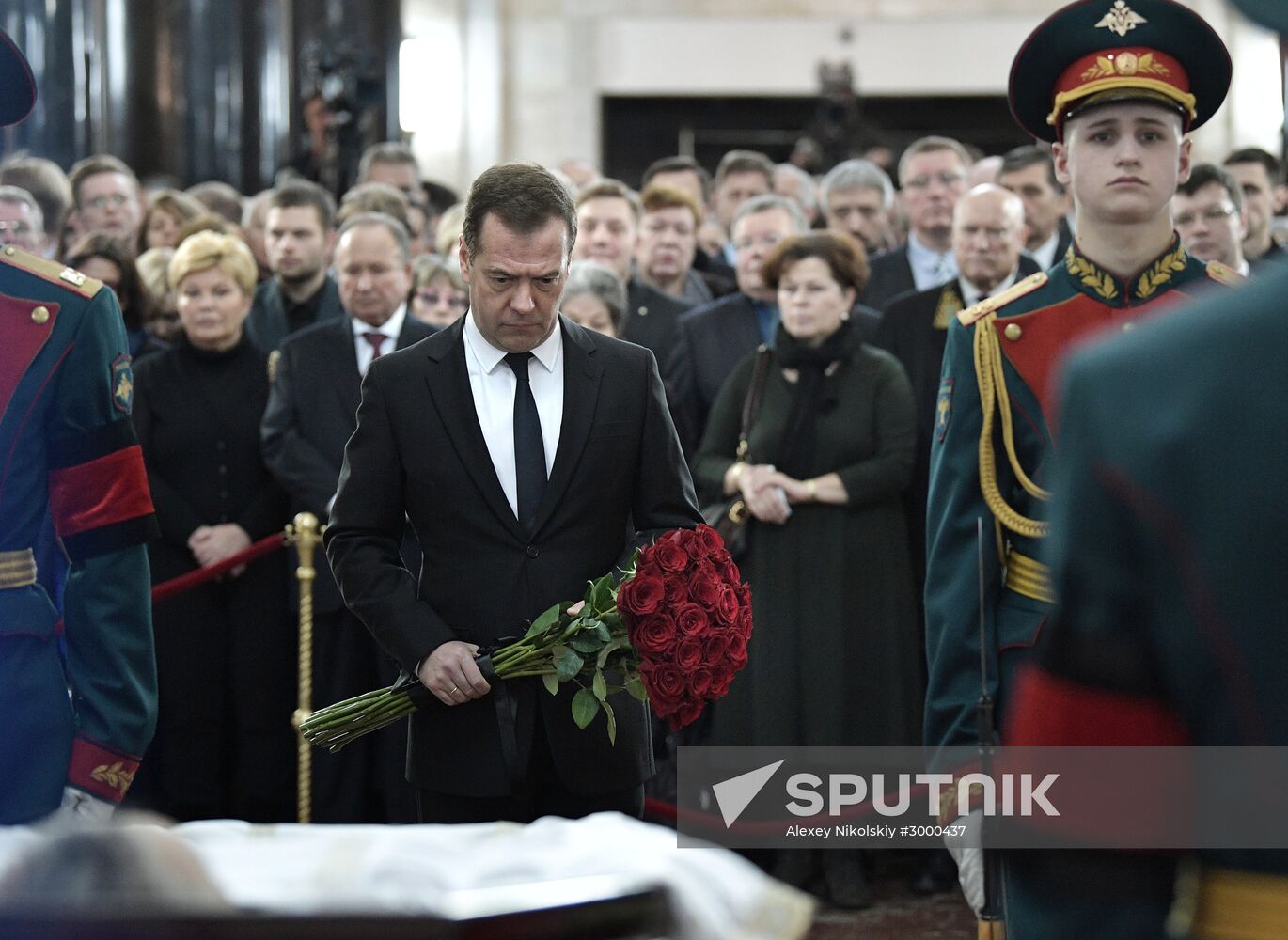 President Vladimir Putin and Prime Minister Dmitry Medvedev pay their last respects to Russian Ambassador to Turkey Andrei Karlov