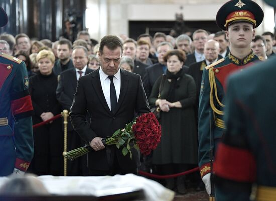 President Vladimir Putin and Prime Minister Dmitry Medvedev pay their last respects to Russian Ambassador to Turkey Andrei Karlov