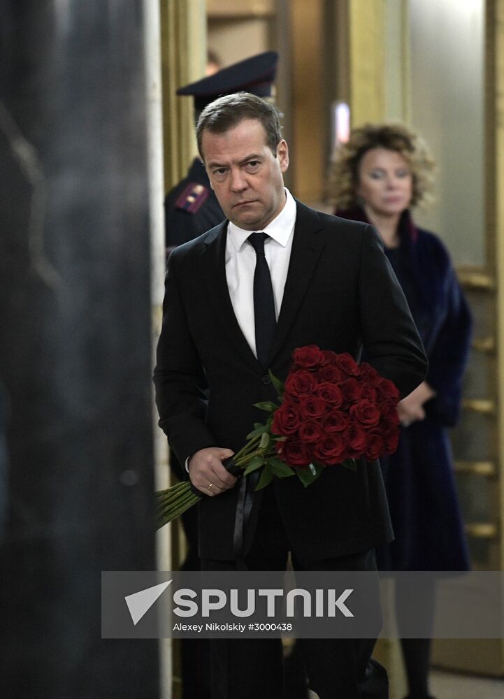 President Vladimir Putin and Prime Minister Dmitry Medvedev pay their last respects to Russian Ambassador to Turkey Andrei Karlov