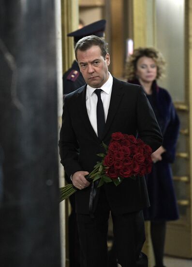 President Vladimir Putin and Prime Minister Dmitry Medvedev pay their last respects to Russian Ambassador to Turkey Andrei Karlov