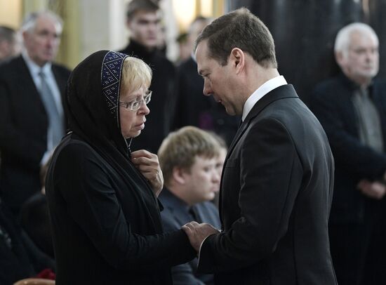 President Vladimir Putin and Prime Minister Dmitry Medvedev pay their last respects to Russian Ambassador to Turkey Andrei Karlov