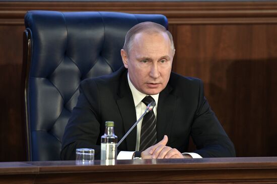Russian President Vladimir Putin takes part in extended board session of Russian Defence Ministry