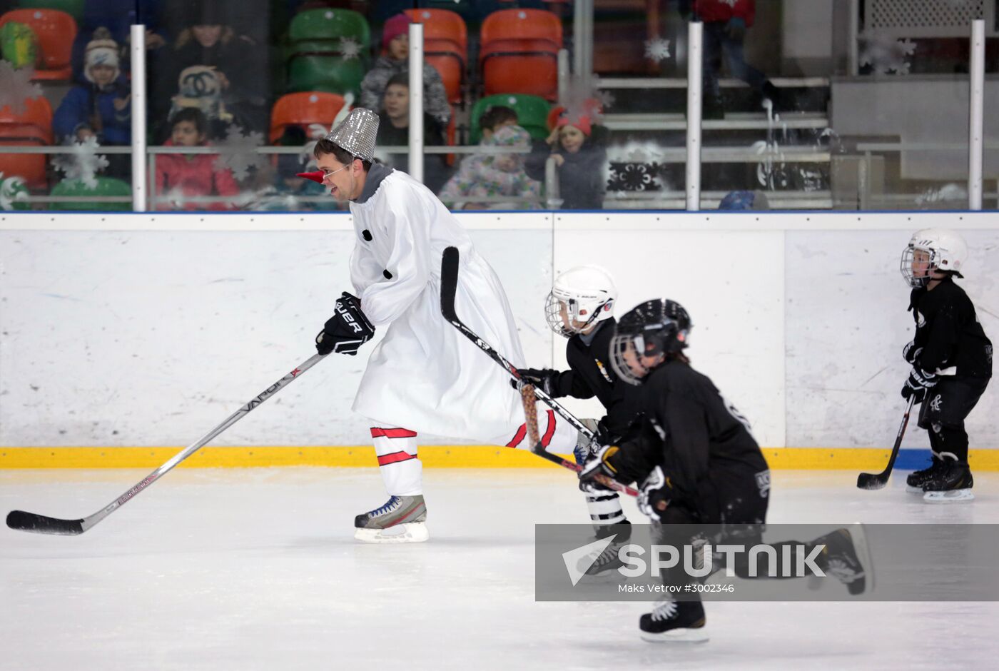 South Penguins face off Father Frost team in an ice hockey game