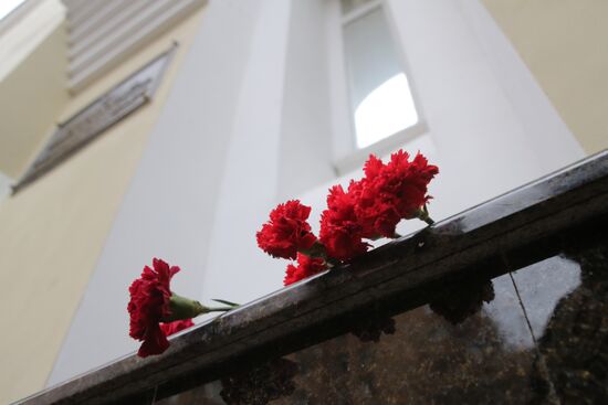 Journalists outside Alexandrov Song and Dance Ensemble building