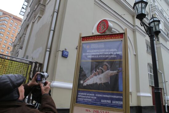 Journalists outside Alexandrov Song and Dance Ensemble building