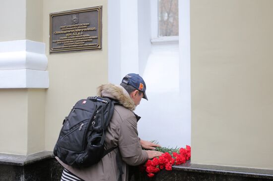 Journalists outside Alexandrov Song and Dance Ensemble building