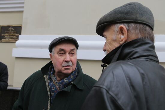 Journalists outside Alexandrov Song and Dance Ensemble building