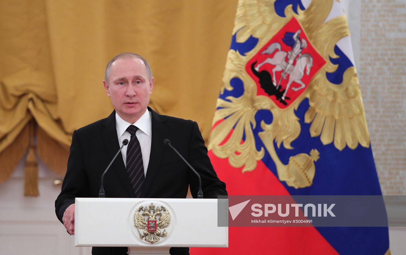 President Vladimir Putin addresses New Year reception at the Kremlin