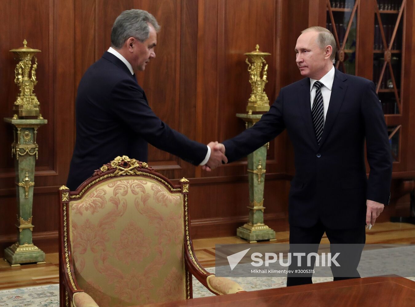 Russian President Vladimir Putin meets with Defense Minister Sergei Shoigu and Foreign Minister Sergei Lavrov