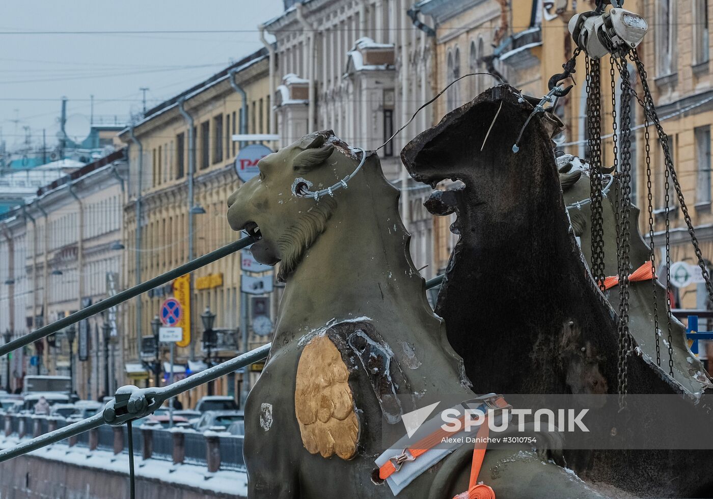 Removing griffin sculptures from Bankovsky Bridge in St. Petersburg
