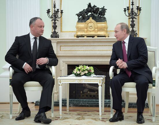 Russian President Vladimir Putin meets with President of Moldova Igor Dodon