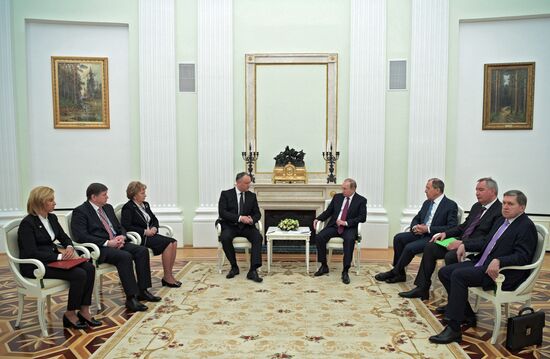 Russian President Vladimir Putin meets with President of Moldova Igor Dodon