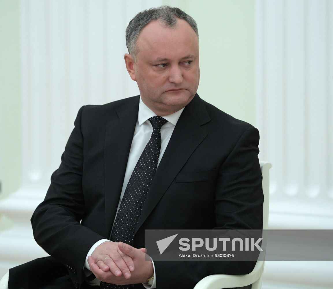 Russian President Vladimir Putin meets with President of Moldova Igor Dodon