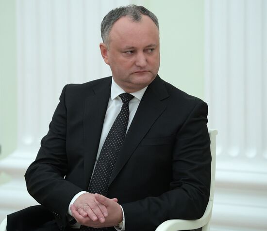 Russian President Vladimir Putin meets with President of Moldova Igor Dodon