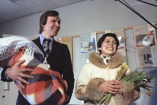 Soviet figure skaters Irina Rodnina and Alexander Zaitsev with son