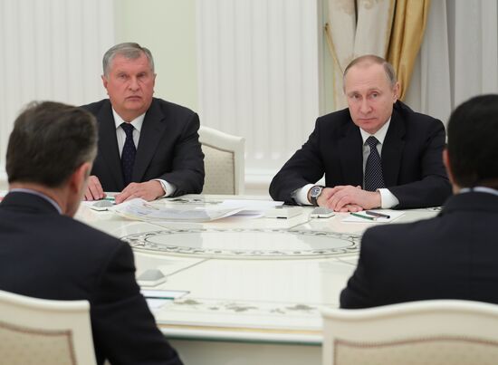 President Vladimir Putin meets with representatives of foreign business circles