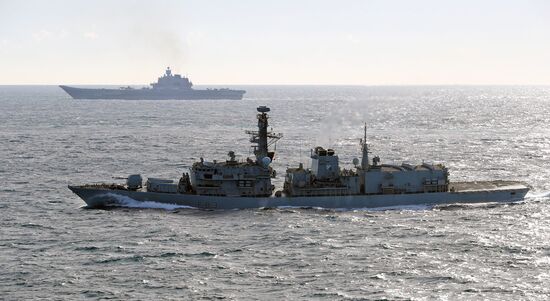British Navy and Air Force escort Admiral Kuznetsov aircraft carrier through the English Channel