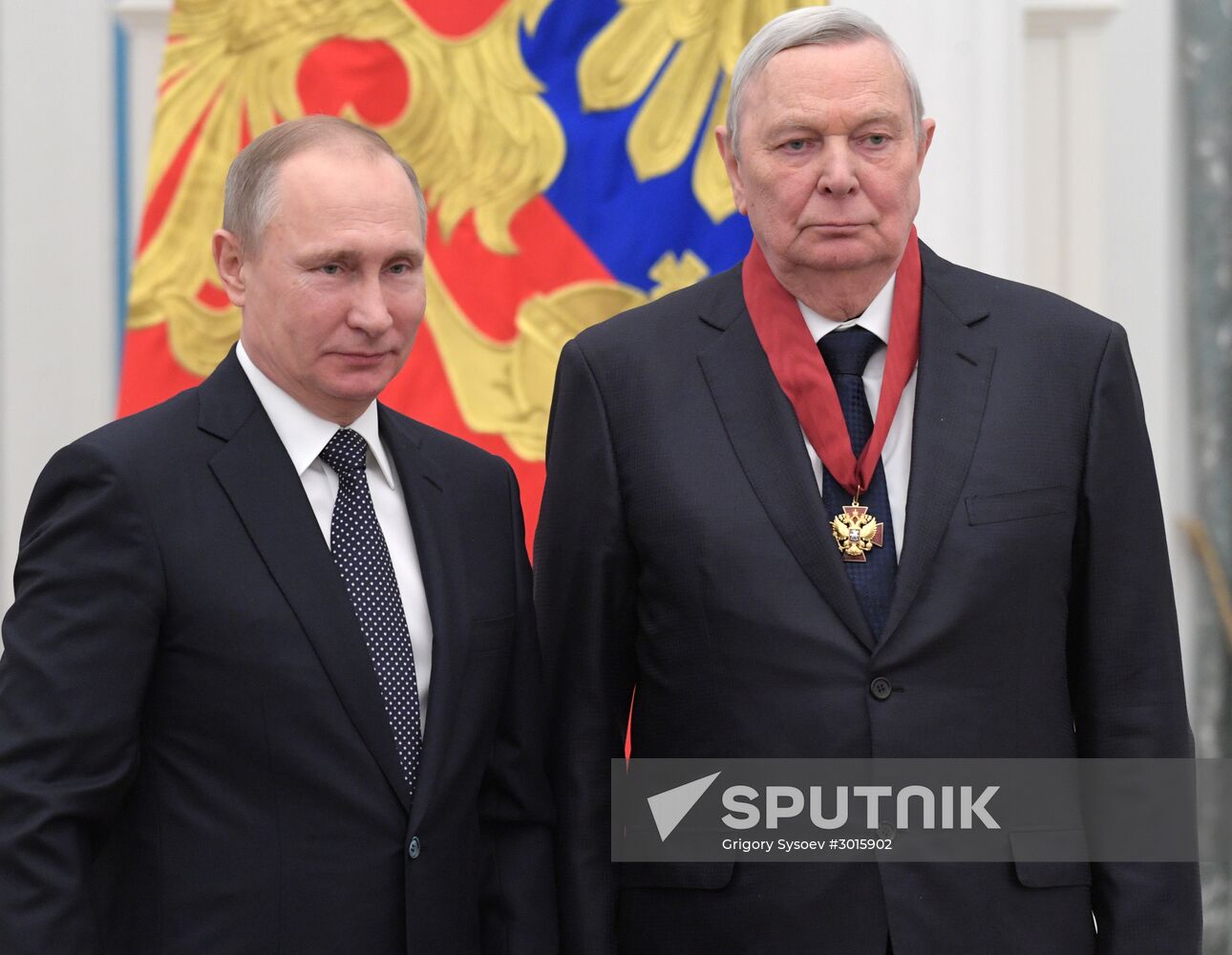 Russian President Vladimir Putin presents state decorations