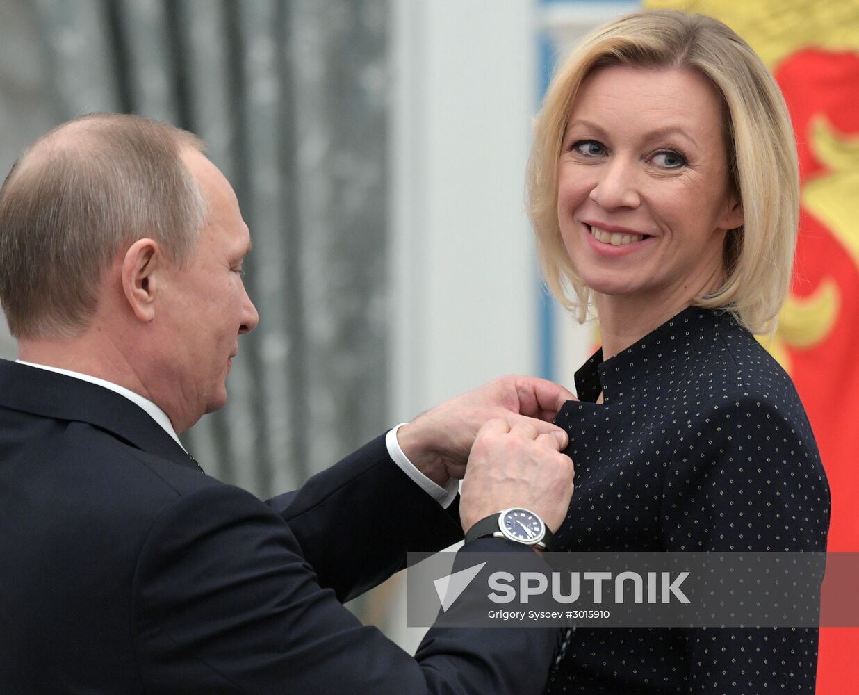 Russian President Vladimir Putin presents state decorations