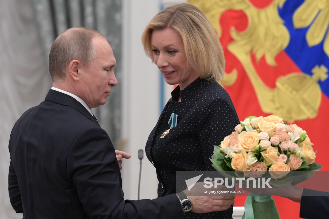Russian President Vladimir Putin presents state decorations