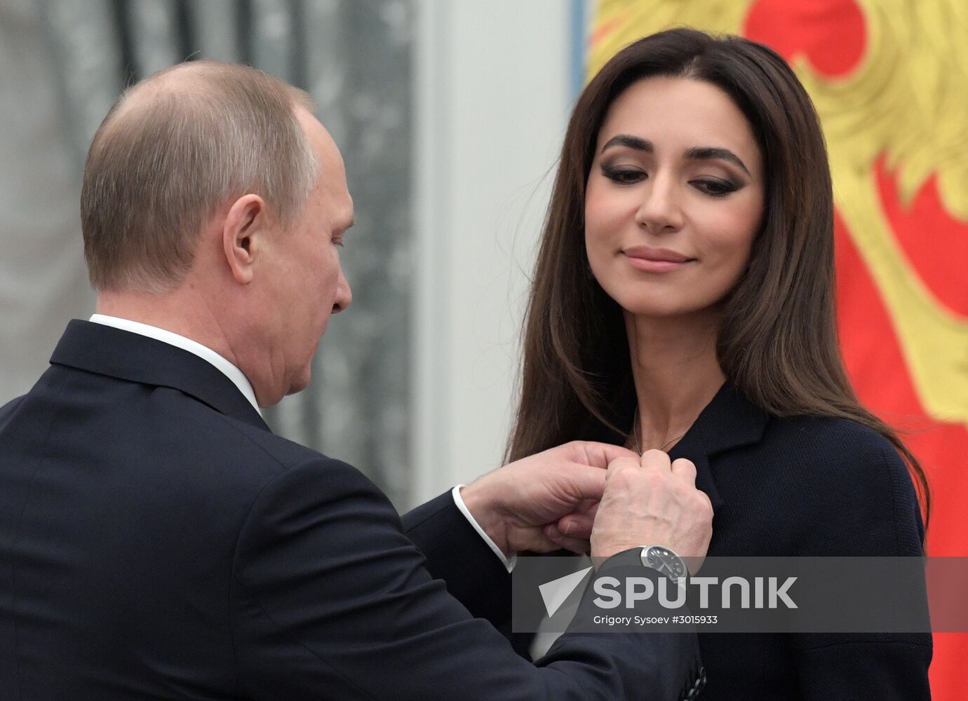 Russian President Vladimir Putin presents state decorations