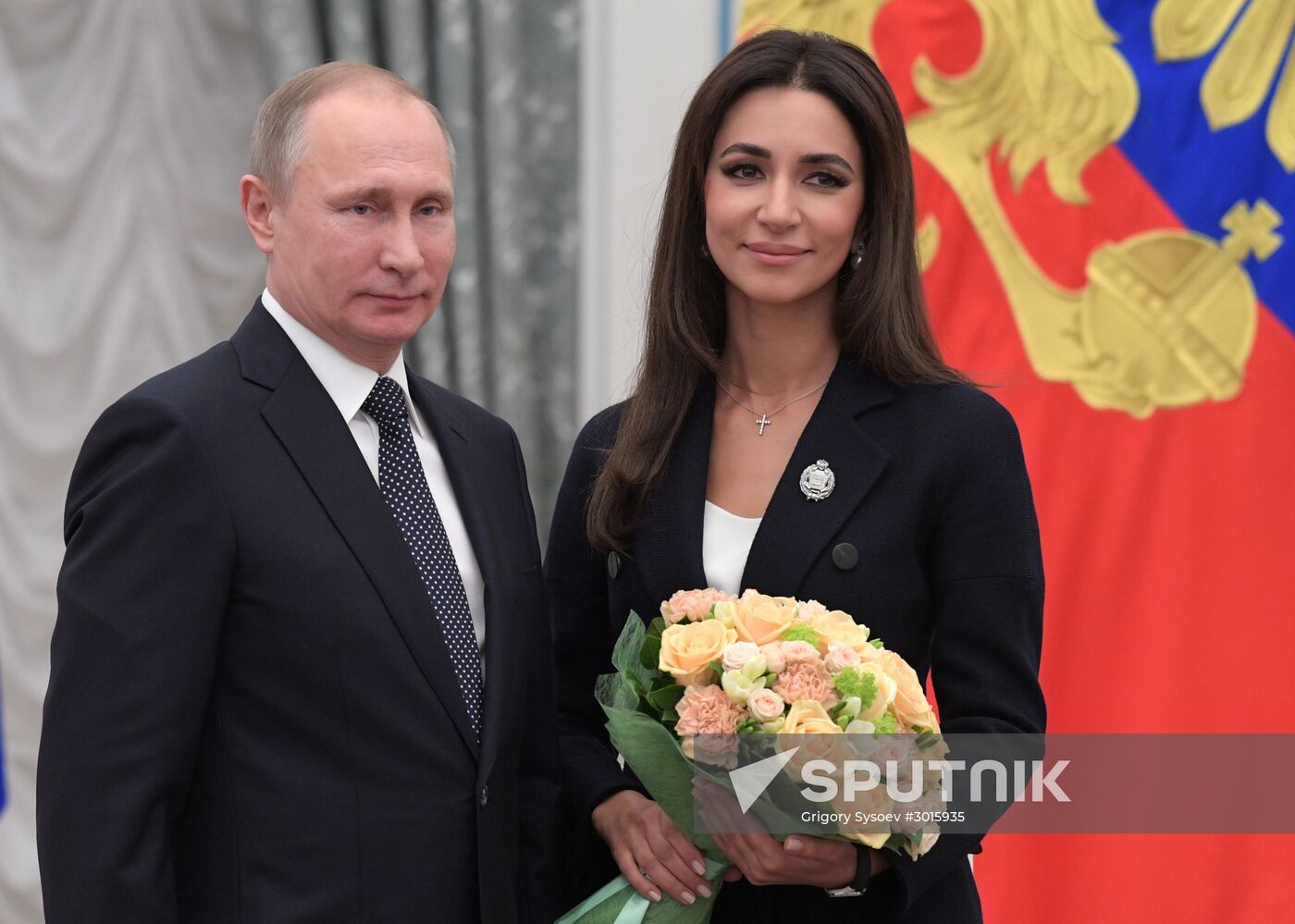 Russian President Vladimir Putin presents state decorations
