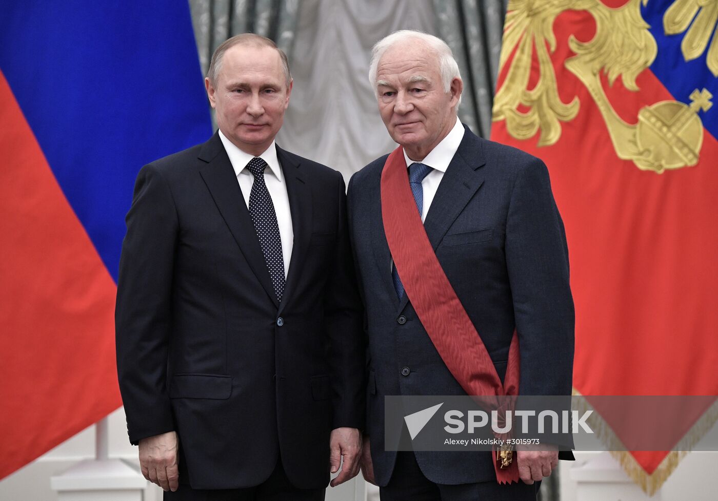 Russian President Vladimir Putin presents state decorations