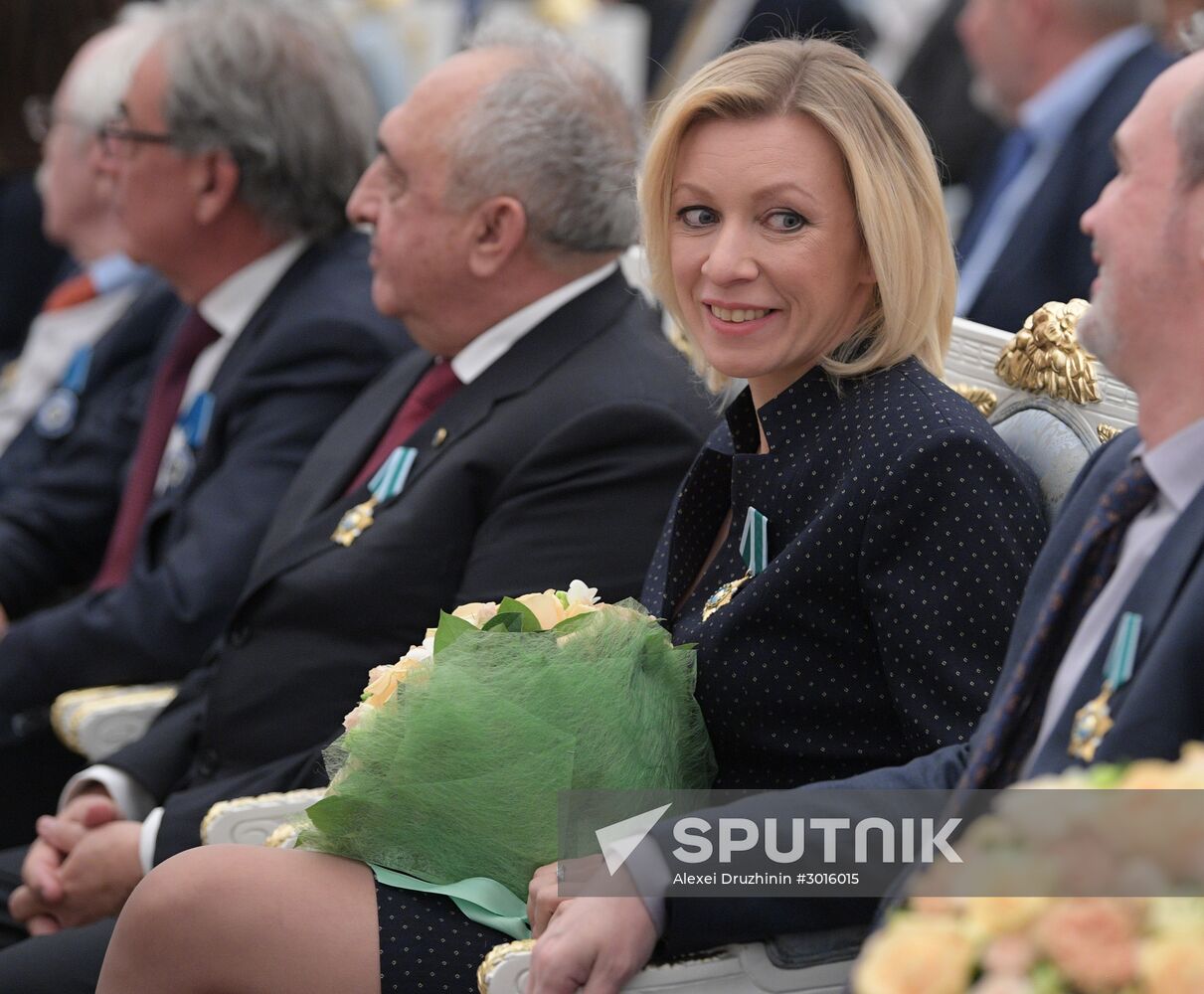 Russian President Vladimir Putin presents state decorations