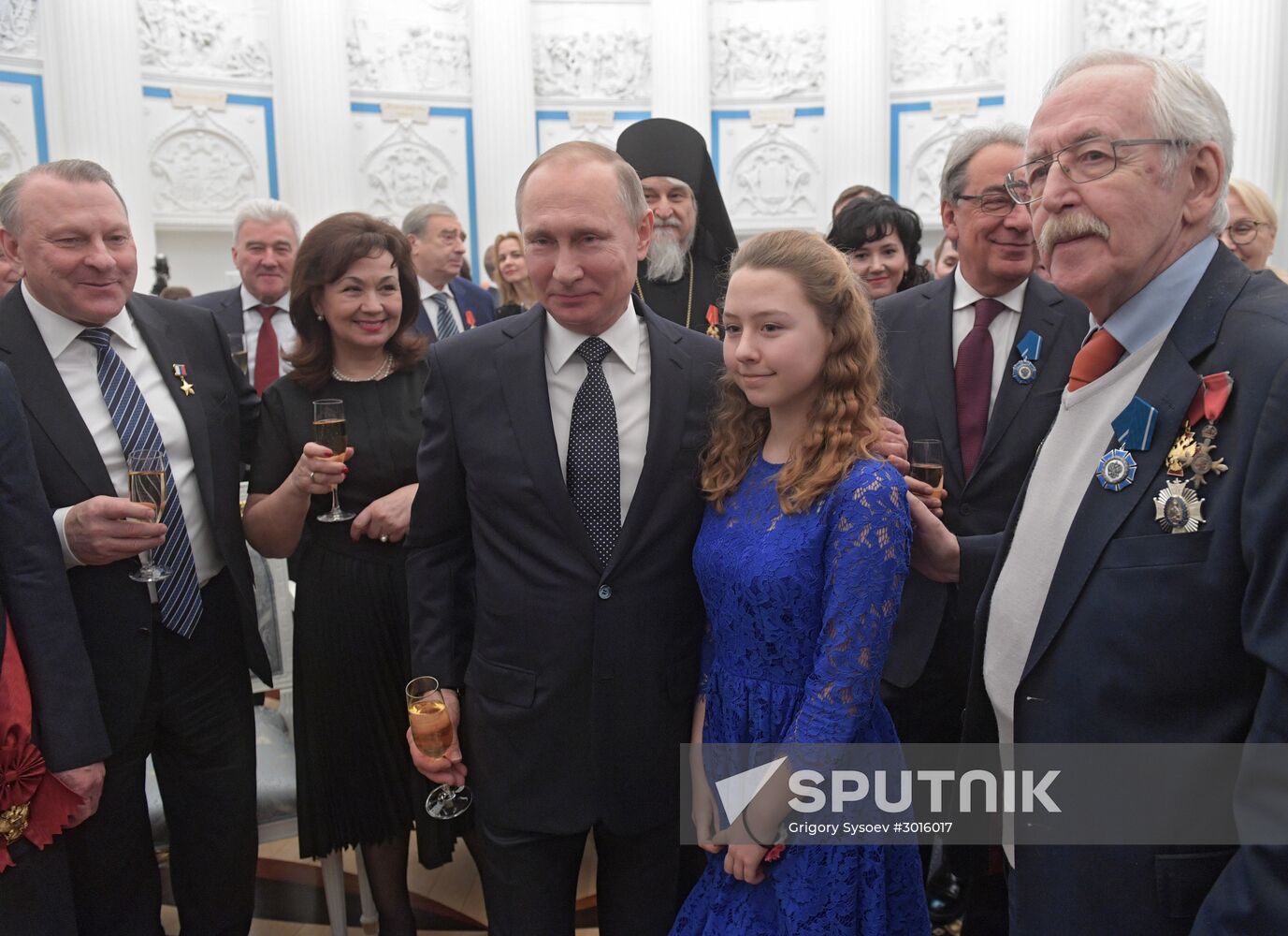Russian President Vladimir Putin presents state decorations