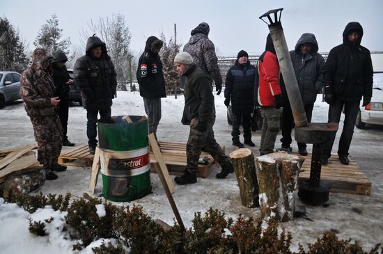 People protest oligarchs' control over power-industry facilities in Ukraine