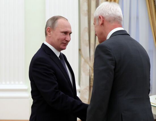 President Vladimir Putin meets with Volkswagen AG Management Board Chair Matthias Müller