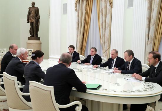 President Vladimir Putin meets with Volkswagen AG Management Board Chair Matthias Müller