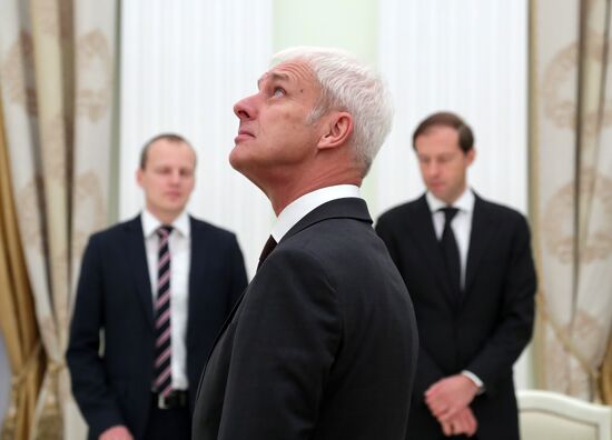 President Vladimir Putin meets with Volkswagen AG Management Board Chair Matthias Müller