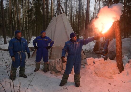Cosmonauts during winter survival training session