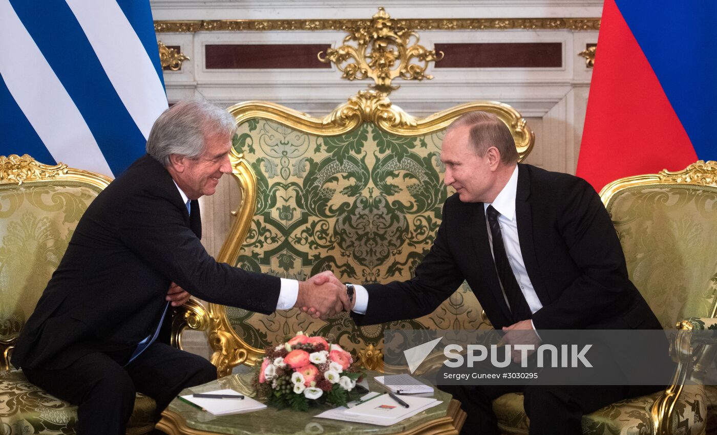 Russian President Vladimir Putin meets with President of Uruguay Tabare Vazquez