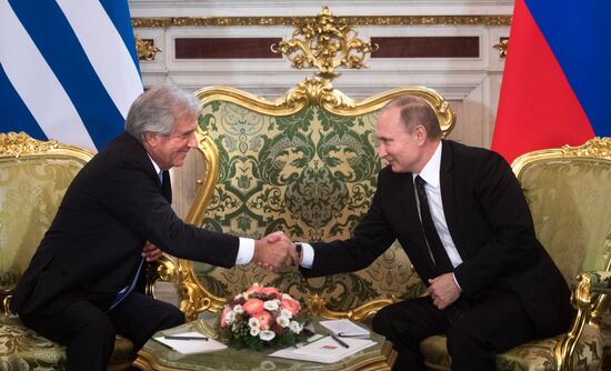 Russian President Vladimir Putin meets with President of Uruguay Tabare Vazquez