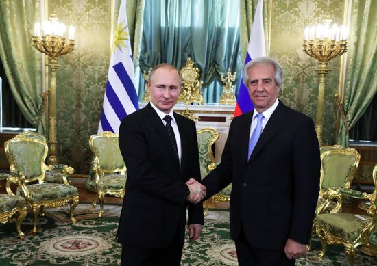 Russian President Vladimir Putin meets with President of Uruguay Tabare Vazquez