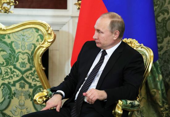 Russian President Vladimir Putin meets with President of Uruguay Tabare Vazquez