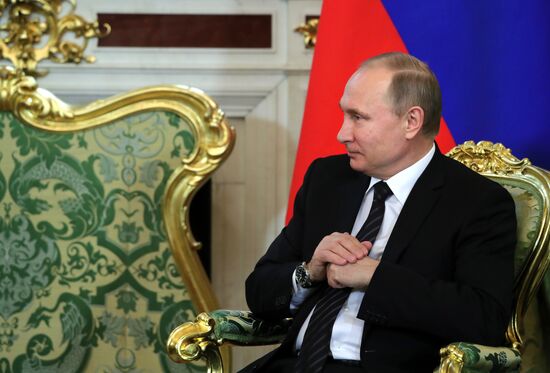 Russian President Vladimir Putin meets with President of Uruguay Tabare Vazquez