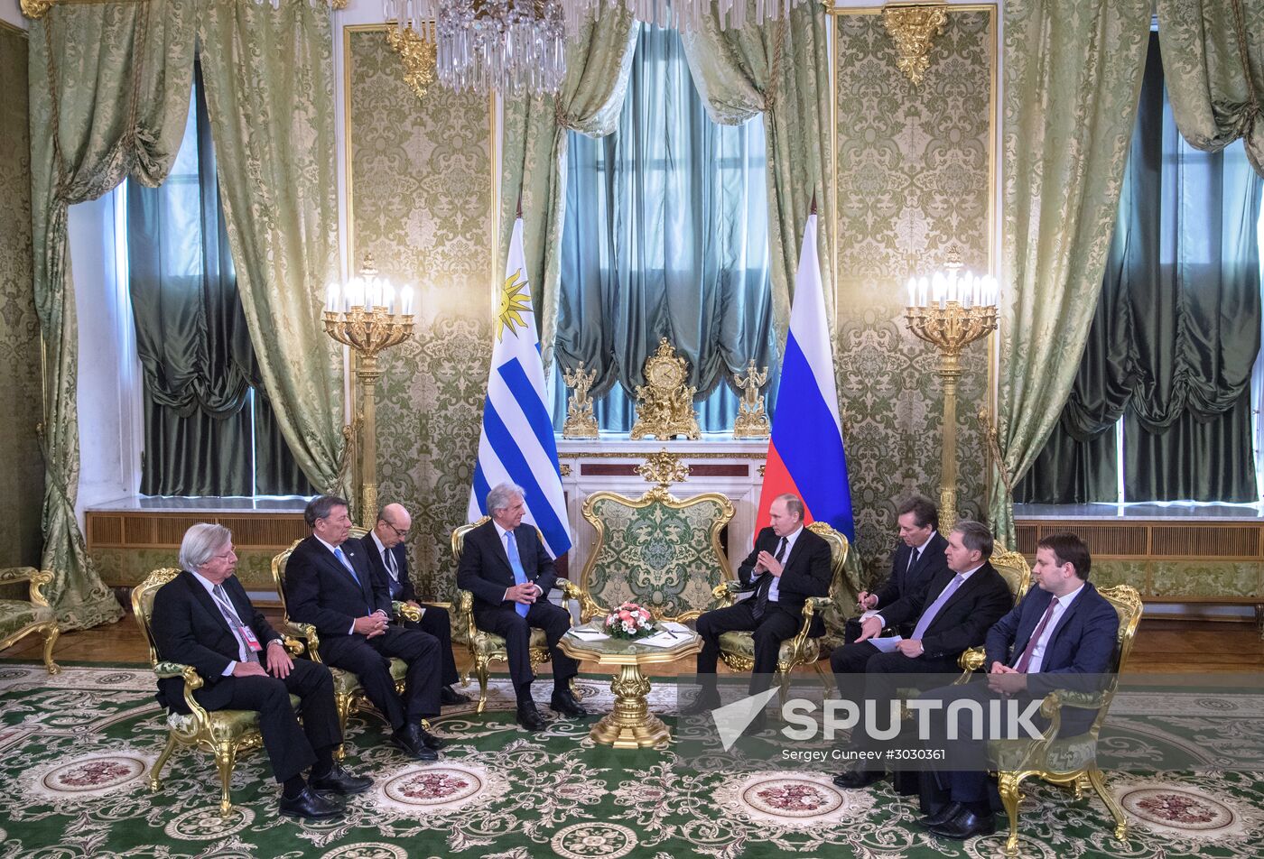 Russian President Vladimir Putin meets with President of Uruguay Tabaré Vazquez