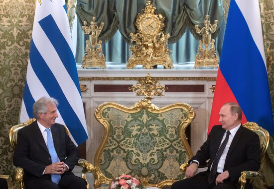 Russian President Vladimir Putin meets with President of Uruguay Tabaré Vazquez