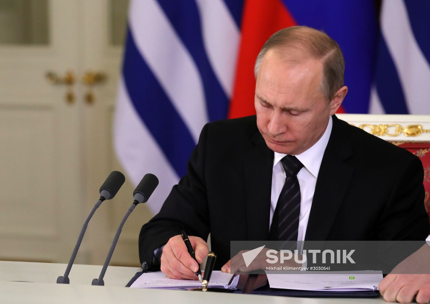 Russian President Vladimir Putin meets with President of Uruguay Tabaré Vazquez