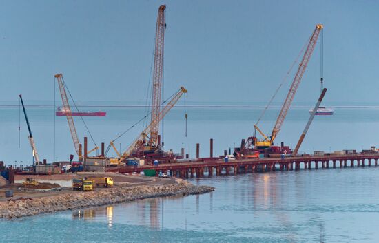Building a bridge across the Kerch Strait from Crimea toward mainland Russia