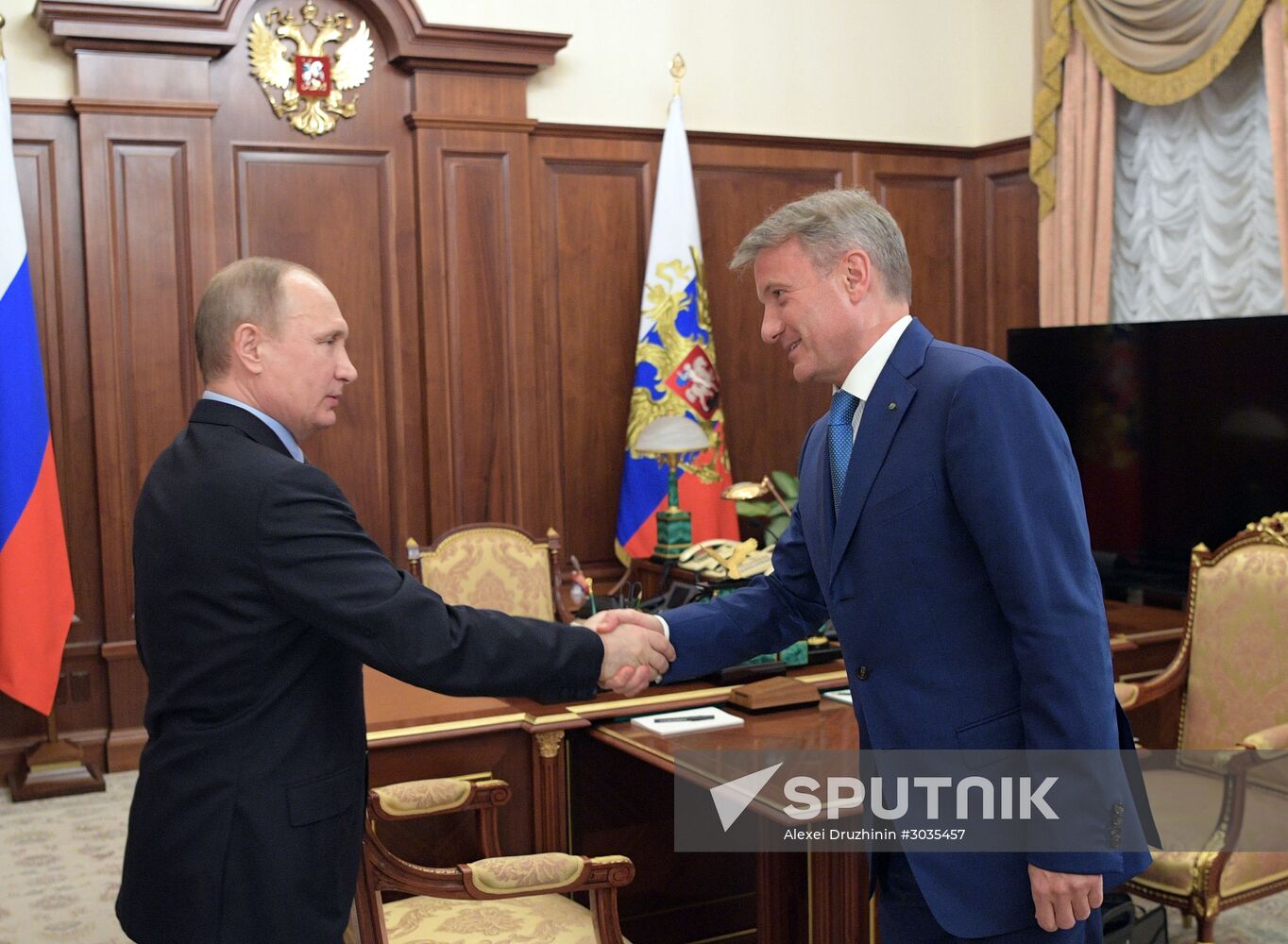 Vladimir Putin meets with Sberbank CEO Gherman Gref