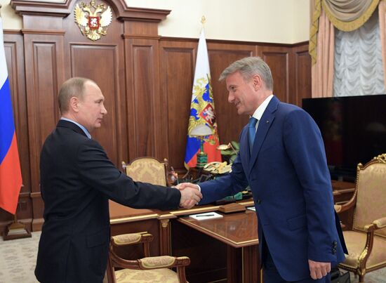 Vladimir Putin meets with Sberbank CEO Gherman Gref