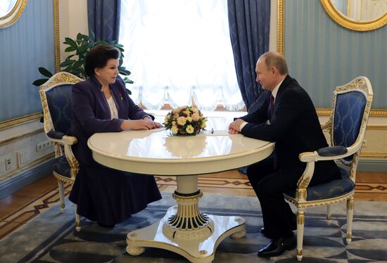 Russian President Vladimir Putin congratulates Valentina Tereshkova on her 80th birthday