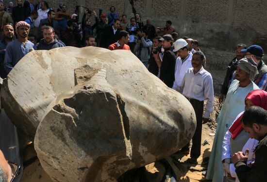 Recovering ancient statue of pharaoh Ranses II in Cairo