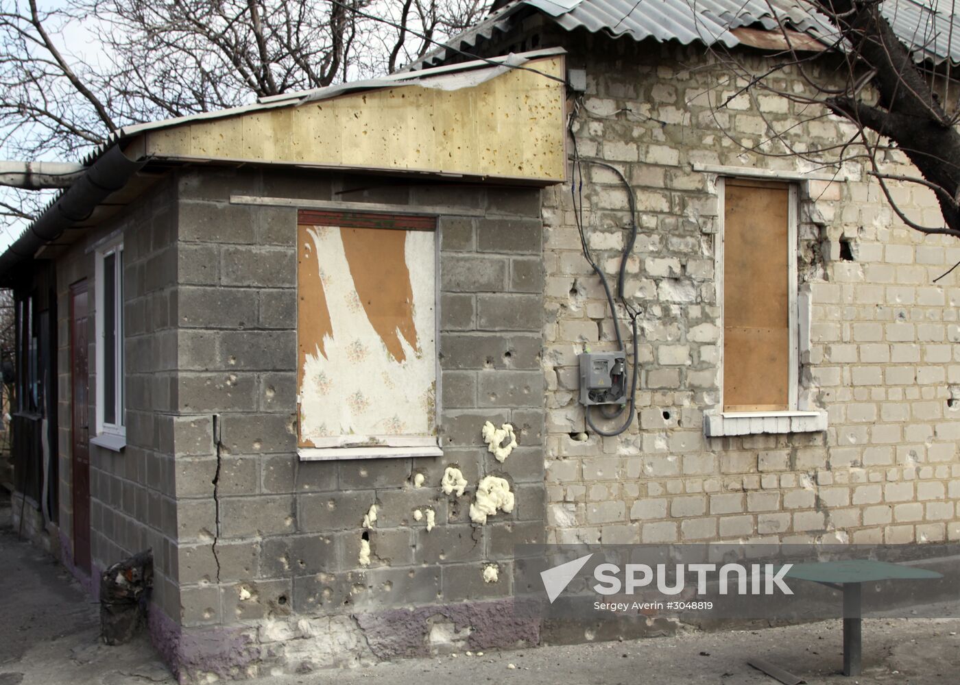 Aftermath of shelling in the town of Luganskoye in the Donetsk Region